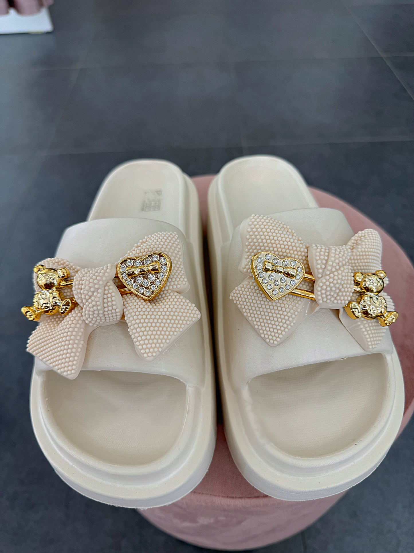 White leisure shoes with gold elements