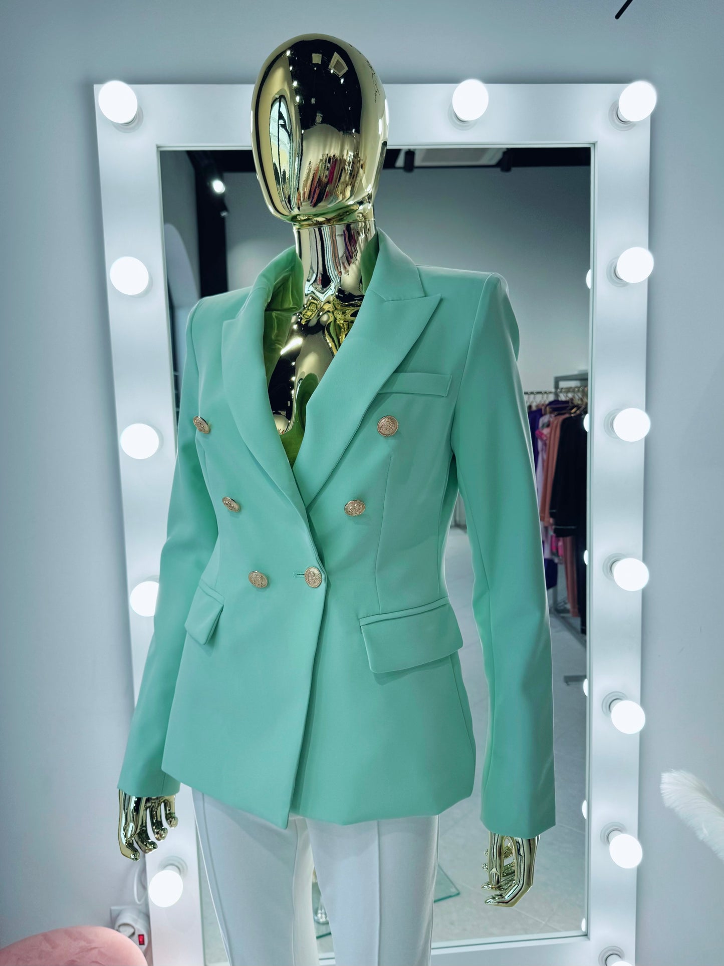 Zaļa klasiska žakete