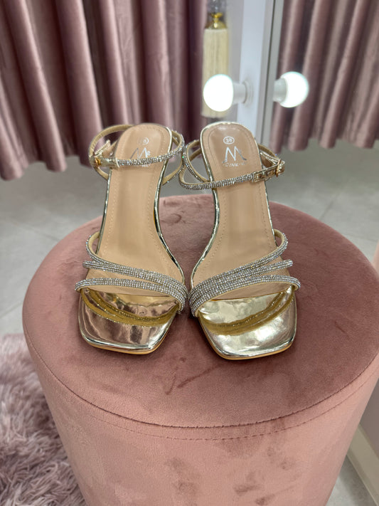 White leisure shoes with gold elements